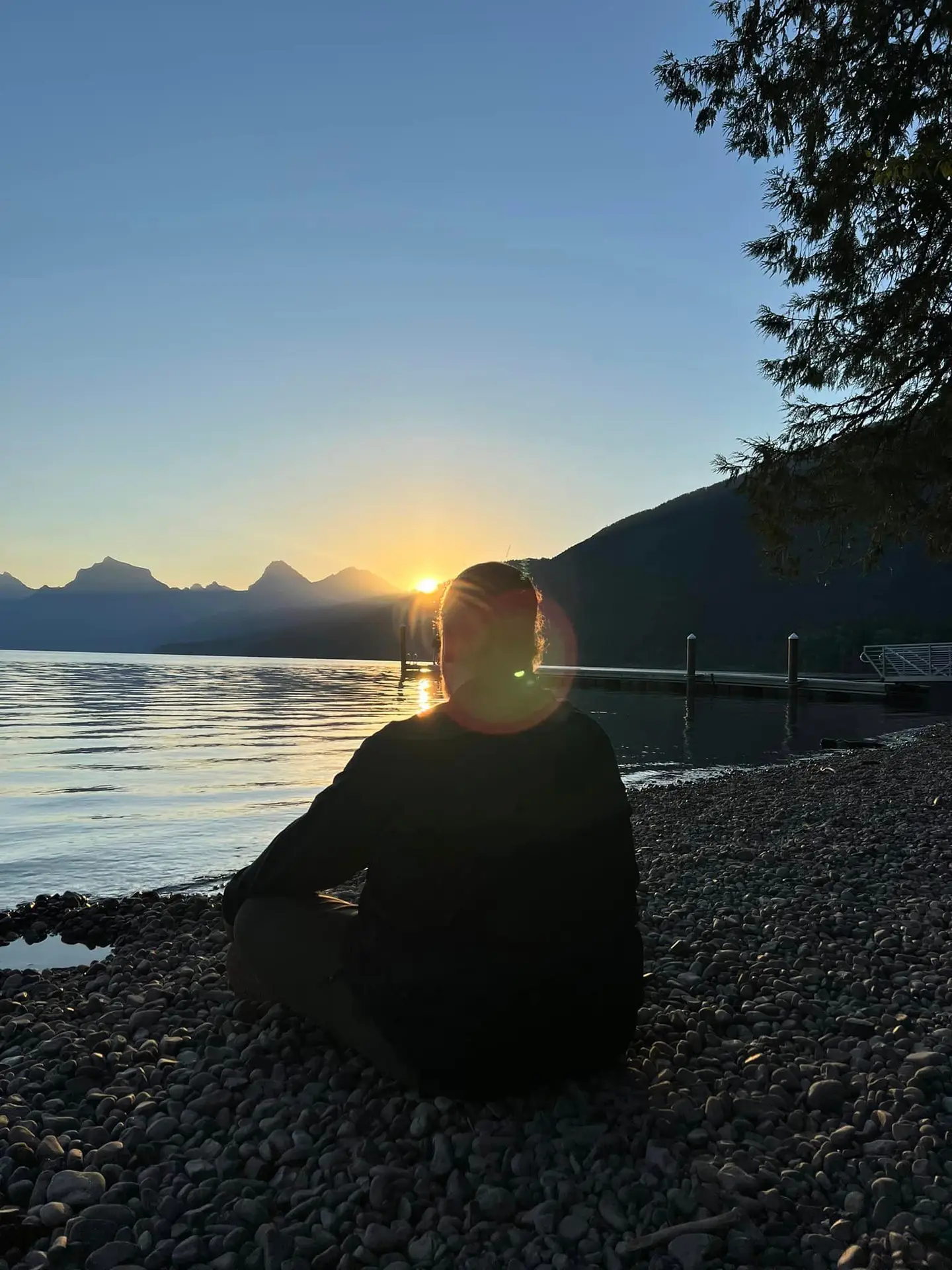 Dr James meditating at Glacier National Park